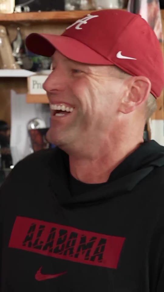 Outstanding Tiny Desk meme, second shot: a close-up of a singer in headphones laughing